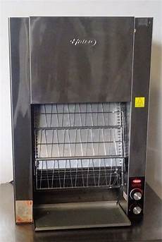 Toaster With Conveyor